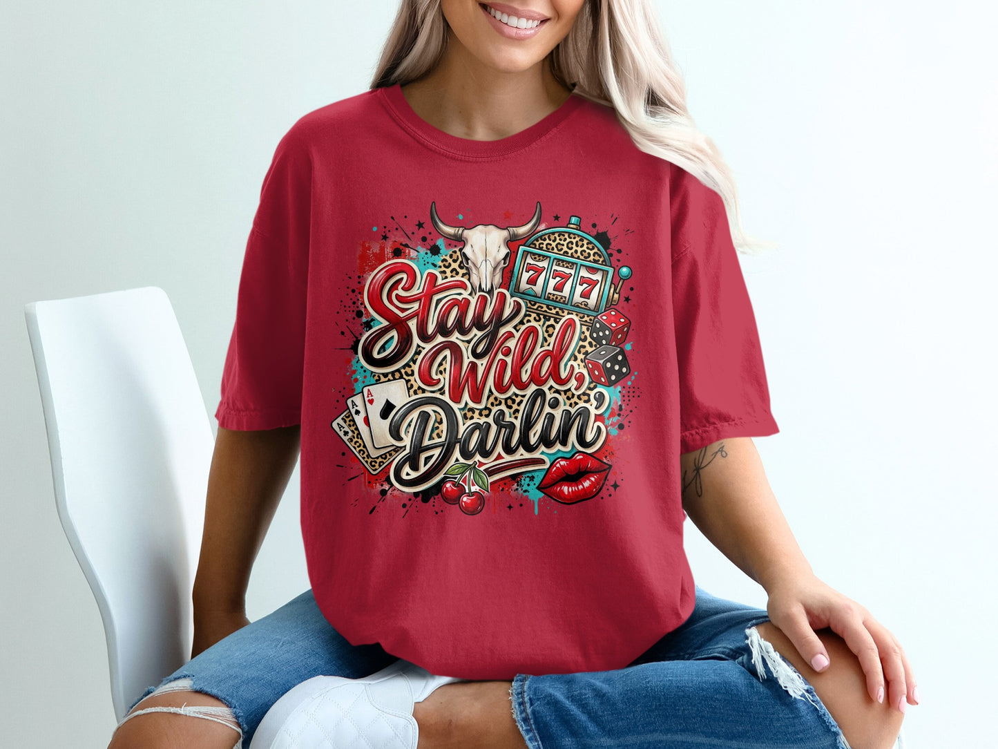 Red t-shirt with "Stay Wild Darlin'" text, casino, and lips graphic.