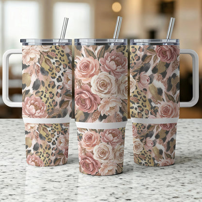Three floral and leopard print tumblers with handles and straws.