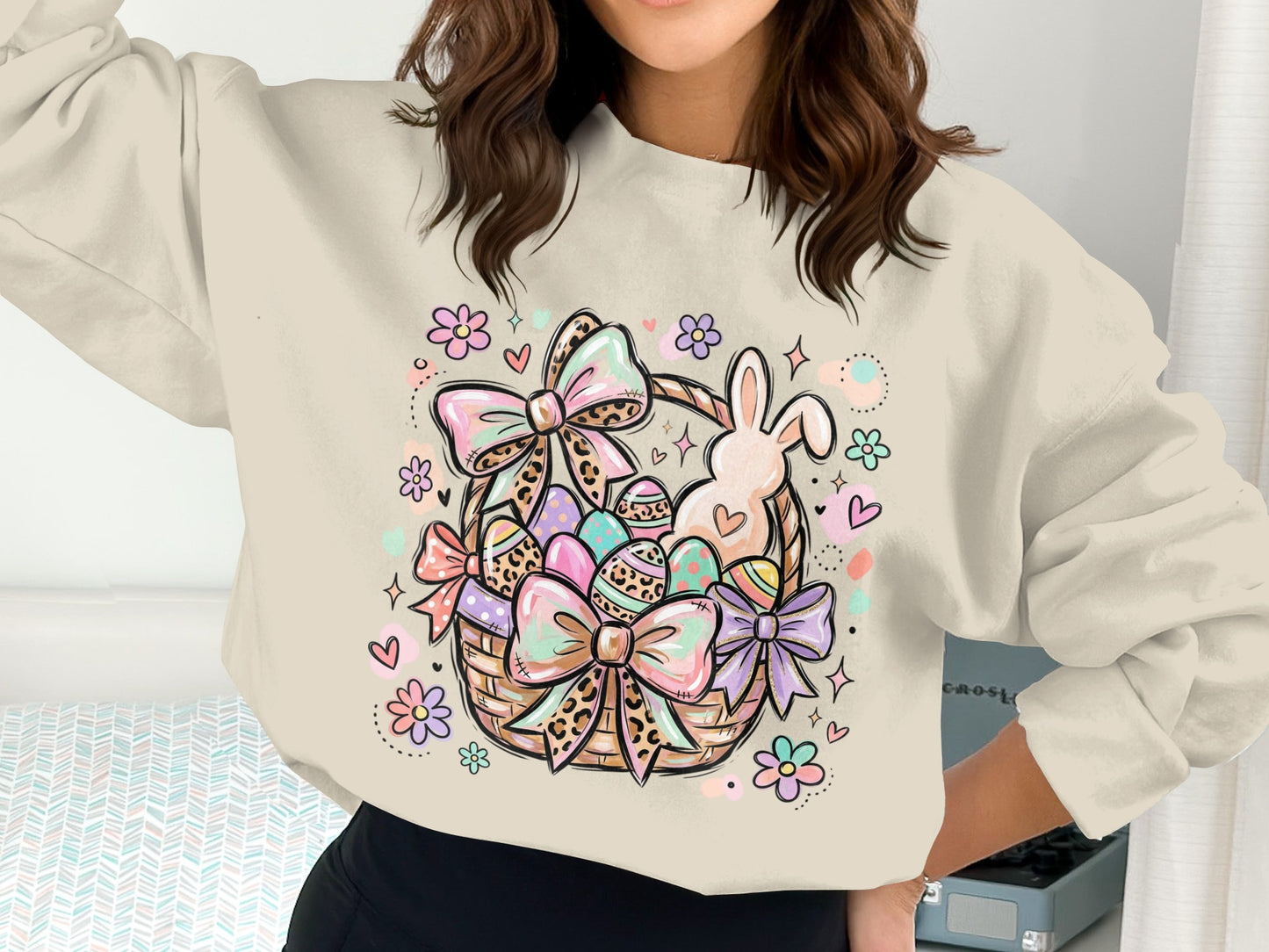 Easter basket with bunny, eggs, bows, and flowers.