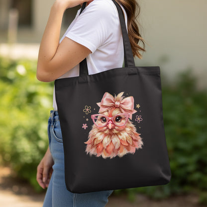 Black tote bag with a cute fluffy chick wearing glasses and a pink bow.