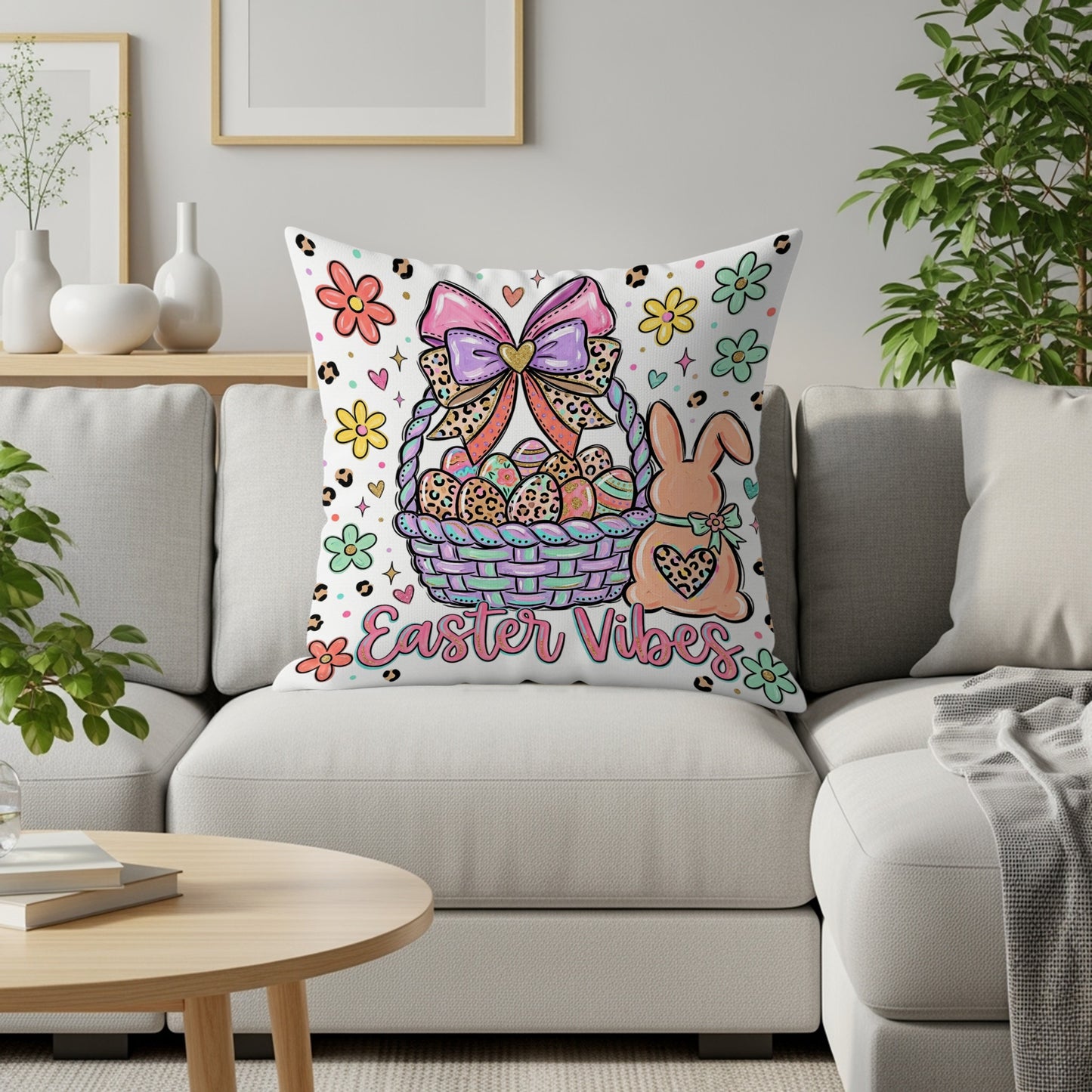 Easter Vibes basket with eggs, bunny, and flowers on decorative pillow.