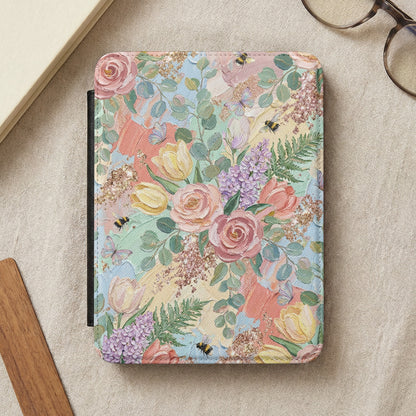 Floral and bumblebee patterned case for an e-reader or tablet.