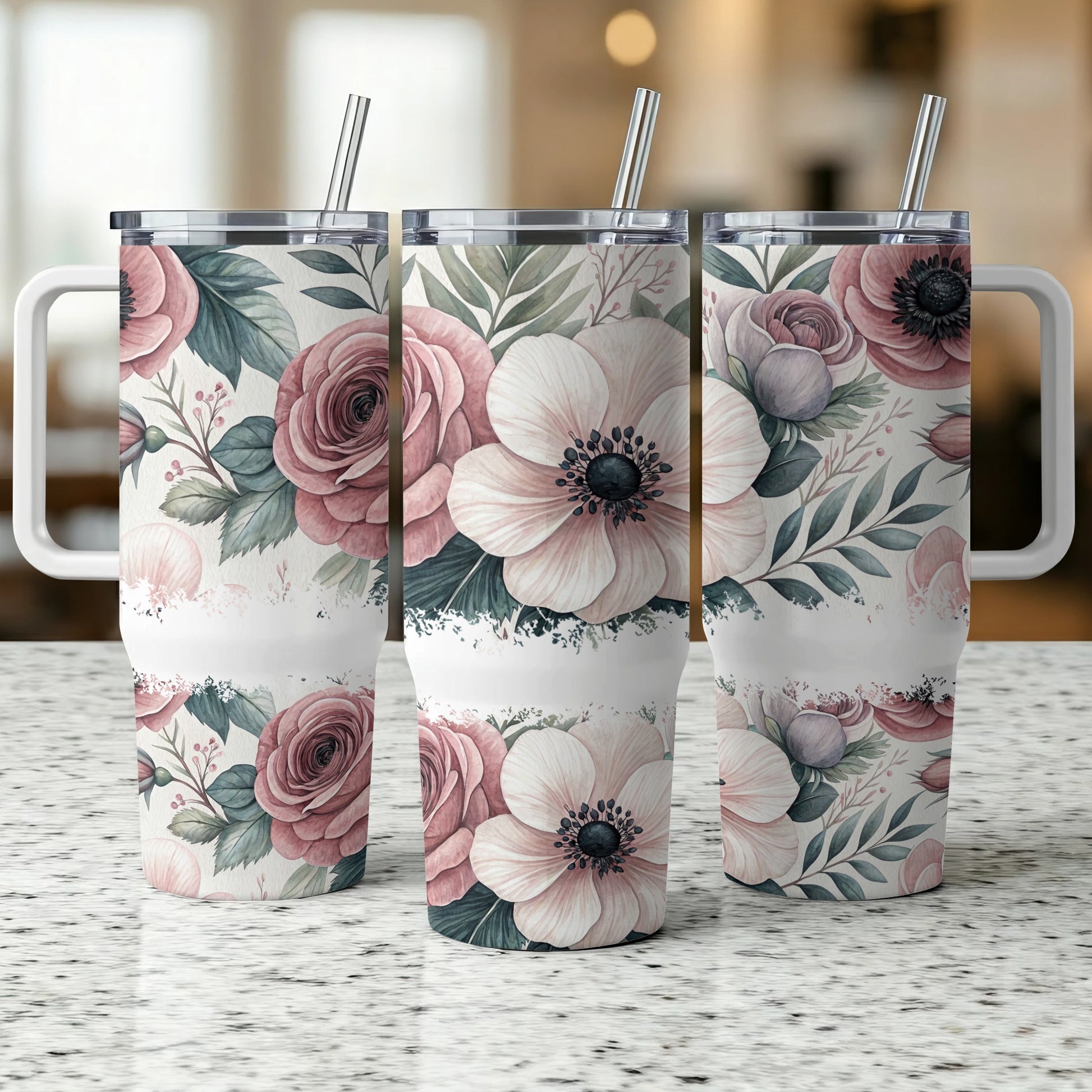 Three floral tumblers with rose and anemone designs, standing side-by-side.