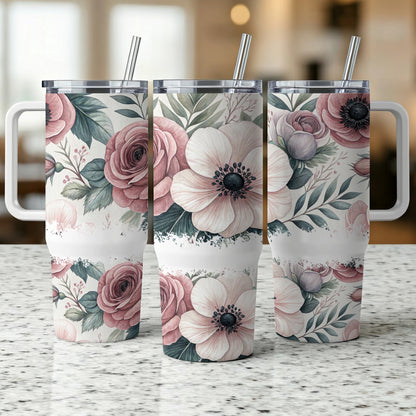 Three floral tumblers with rose and anemone designs, standing side-by-side.