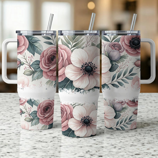 Three floral tumblers with rose and anemone designs, standing side-by-side.