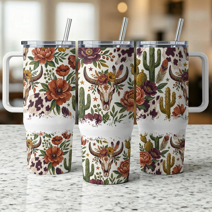 Three tumblers with floral, cactus, and cow skull western design.