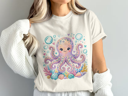 Cream t-shirt with cute watercolor octopus and seashells graphic.
