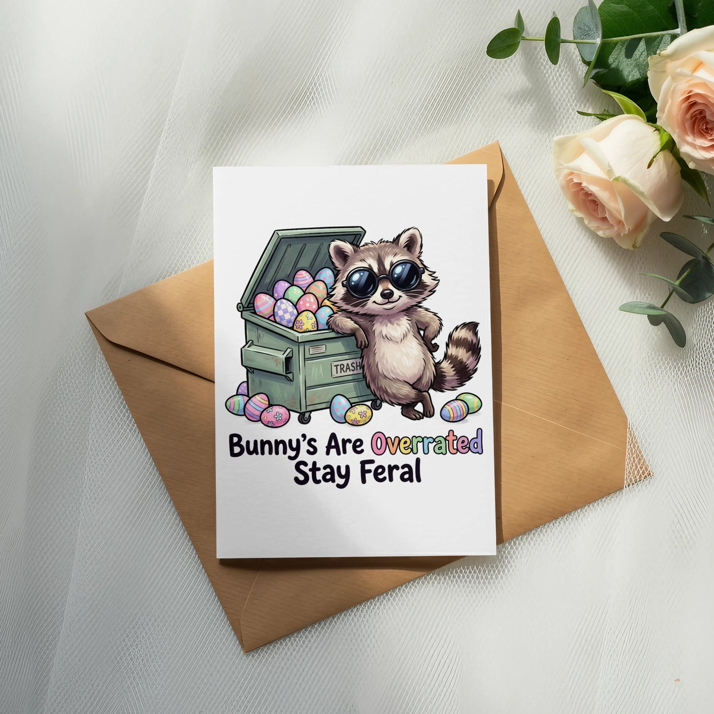 Card with raccoon and Easter eggs, text "Bunny's Are Overrated Stay Feral".