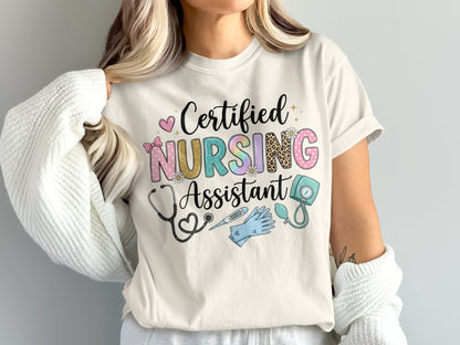 Cream t-shirt with "Certified Nursing Assistant" text and medical graphics.