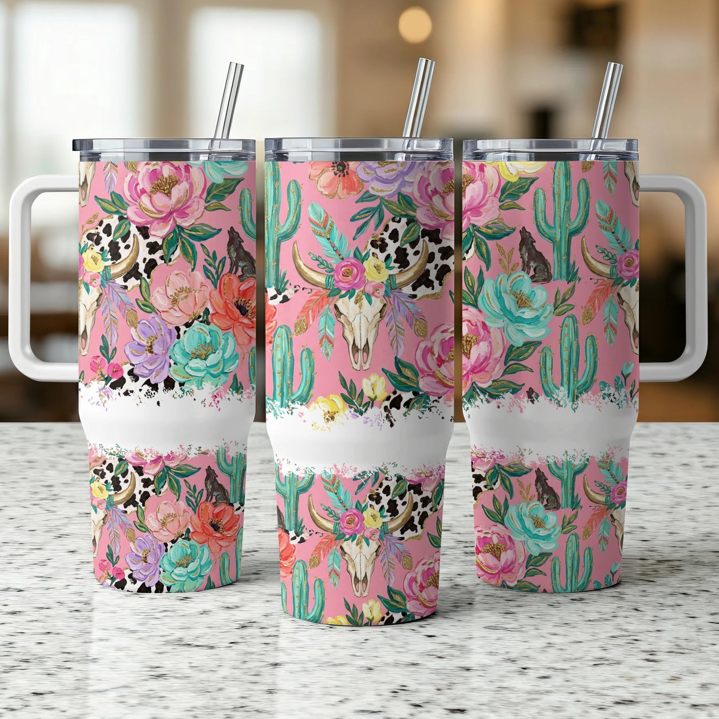 Pink tumbler with cow skull and floral, cactus pattern.