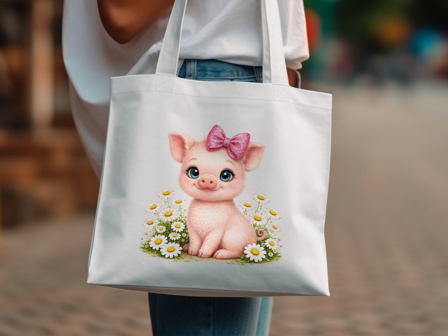Cute pink pig with a pink bow surrounded by daisies on a white tote bag.