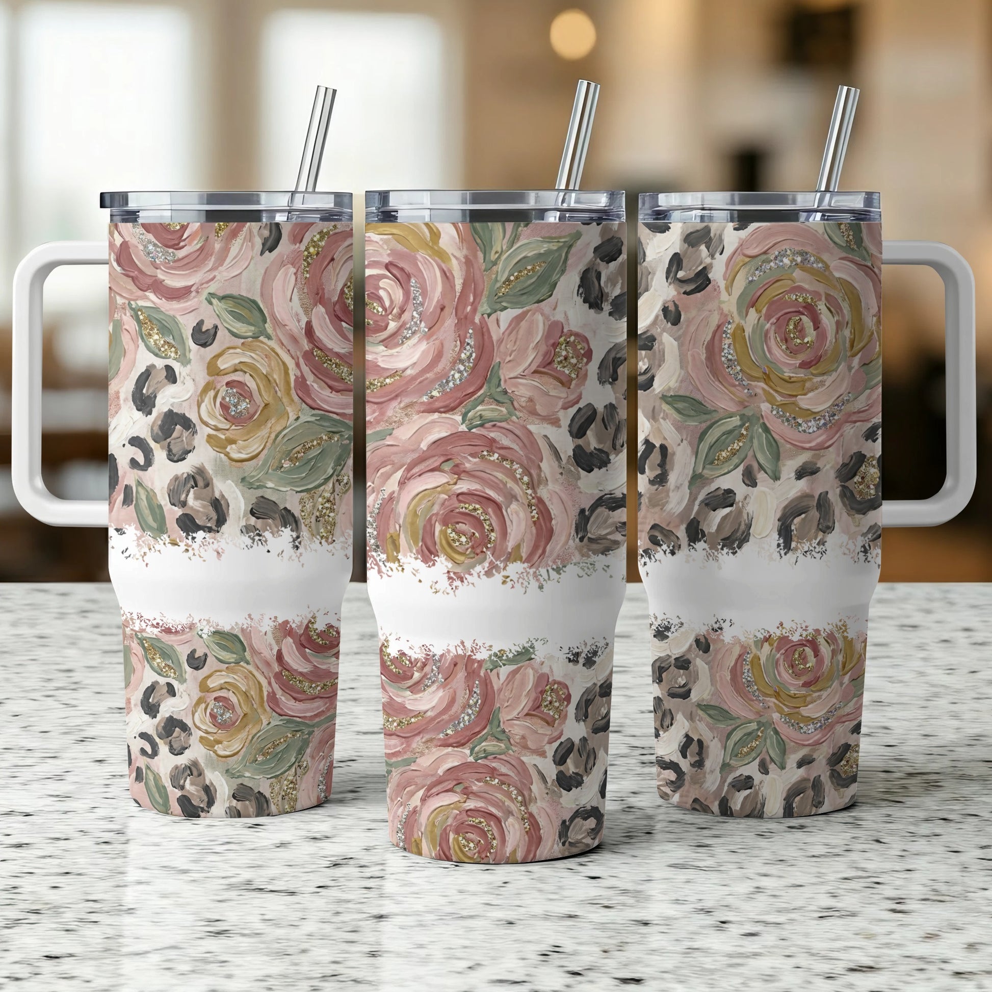 Three floral tumblers with leopard print accent and a ribbed band.