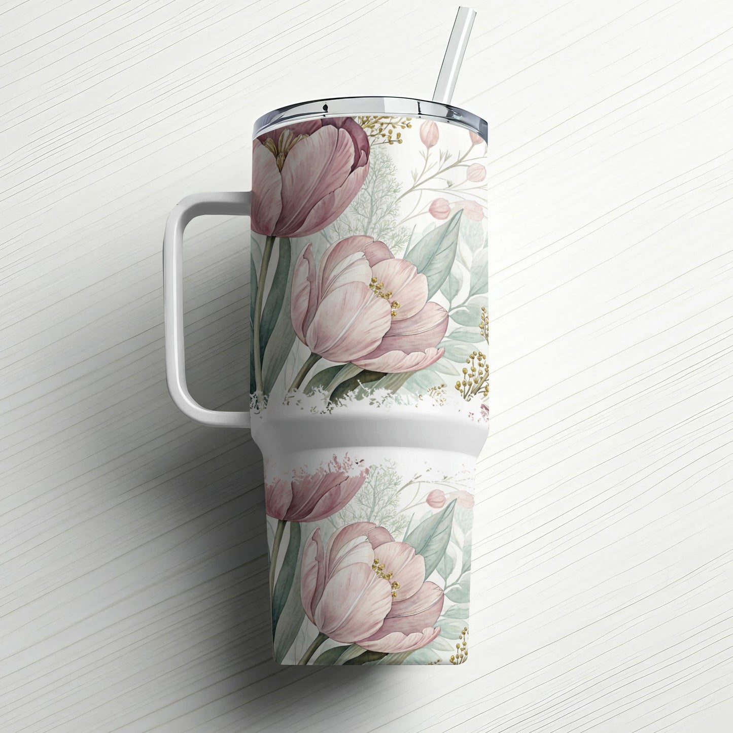 Tumbler with pink tulips and green foliage design, with straw.