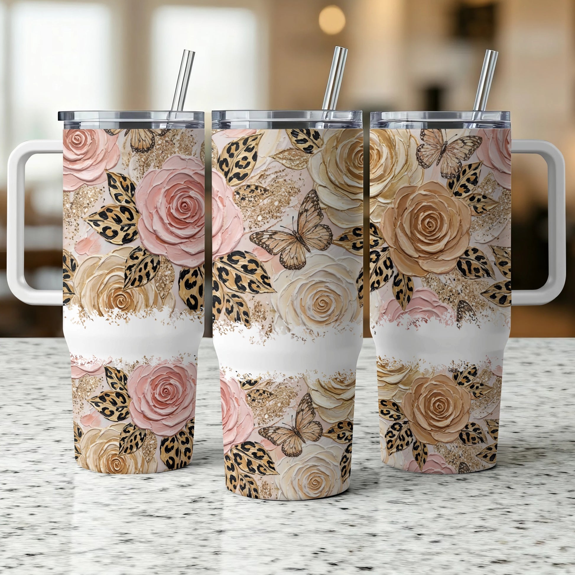 Three floral patterned tumblers with butterflies and leopard print details.