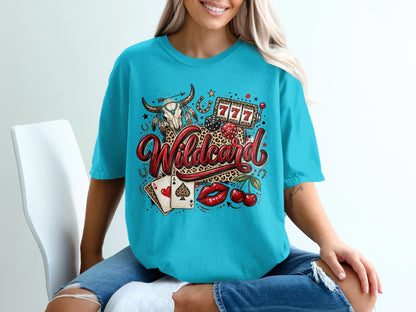Graphic tee with wildcard, bull skull, cherries, dice, and playing cards.