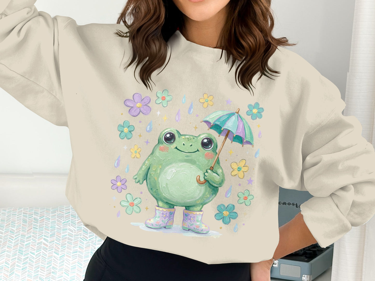Frog in rain boots and umbrella, surrounded by flowers.