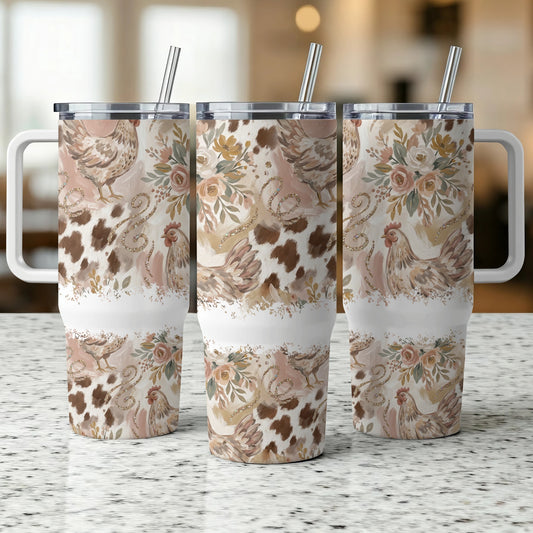 Three patterned tumblers with chickens, flowers, and cow print designs.