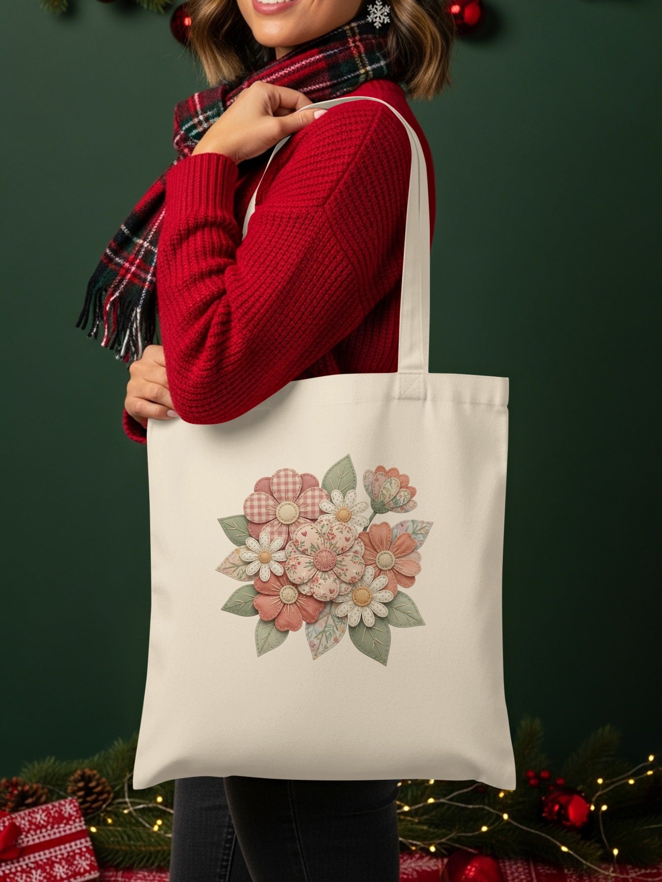 Beige tote bag featuring a floral pattern of pink and white flowers and green leaves.
