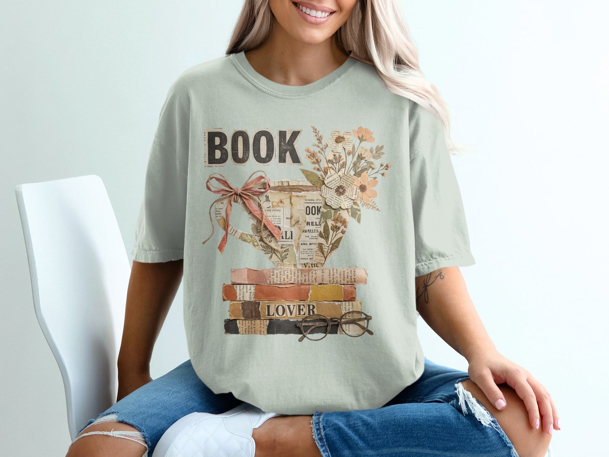 T-shirt with "BOOK LOVER" text and a stack of books with flowers.