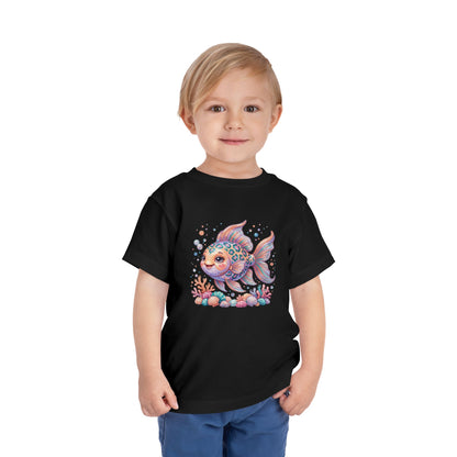Child wearing black t-shirt with a colorful cartoon fish and coral print.