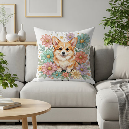 Corgi on floral pillow on couch.