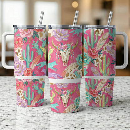 Floral and cactus patterned tumbler with a skull design.