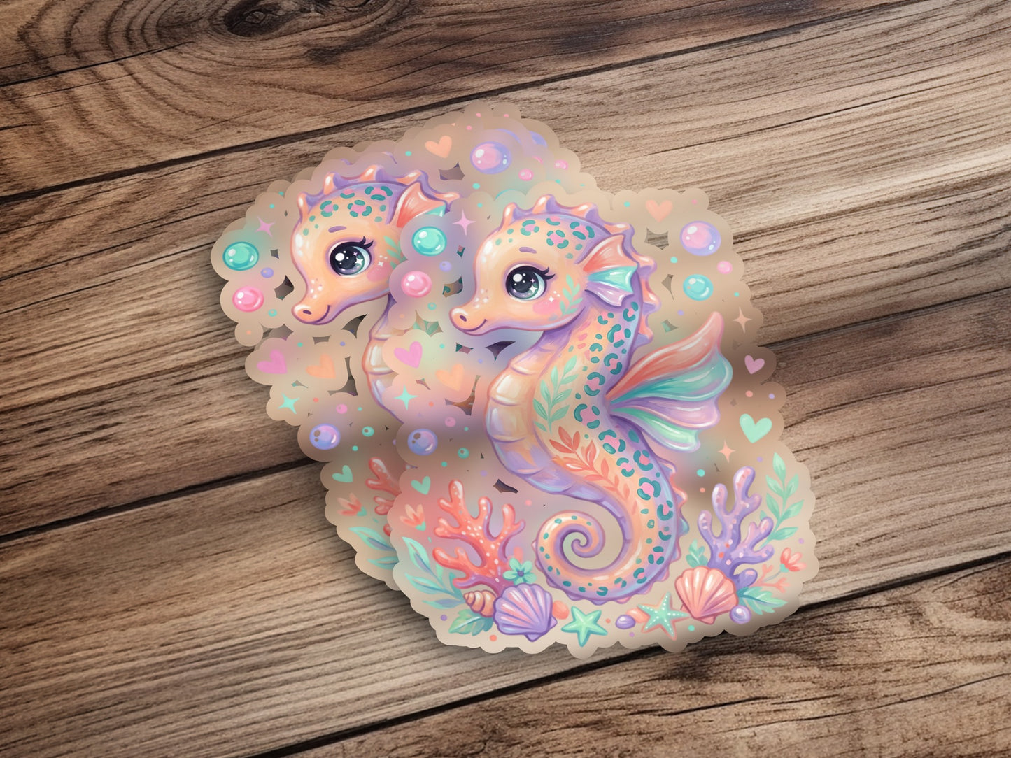 Two cartoon seahorses embracing, surrounded by coral and seashells.