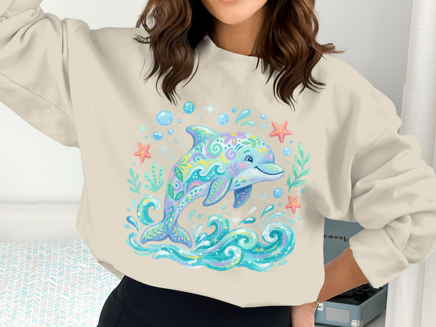 Crewneck sweatshirt with a colorful, floral dolphin design and ocean waves.