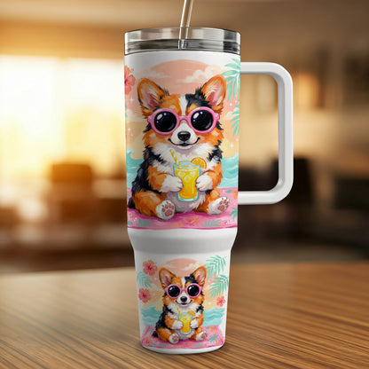 Corgi in sunglasses holding an orange drink on a beach towel.
