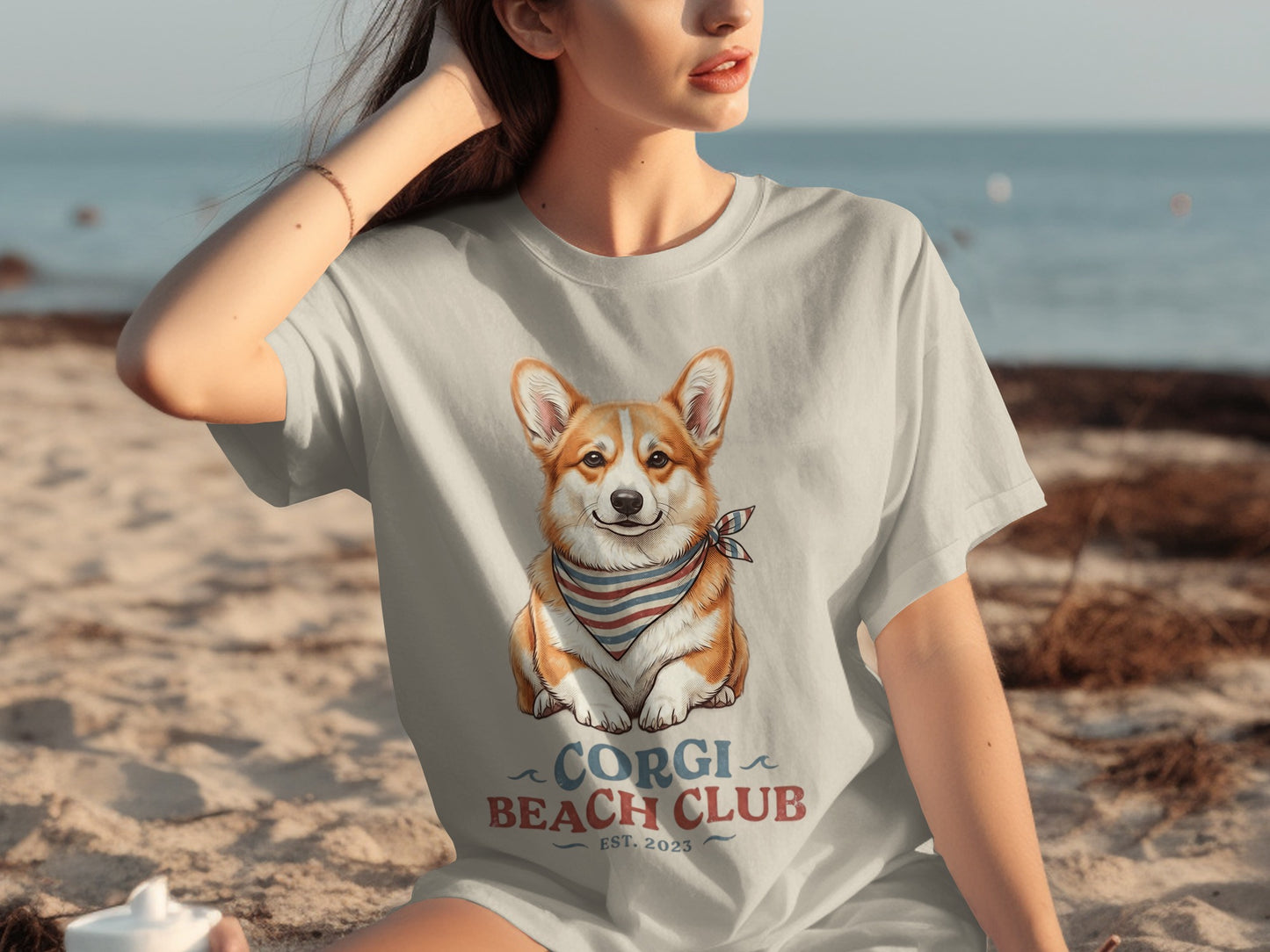 Light gray t-shirt with a corgi wearing a bandana, "Corgi Beach Club" text.