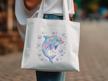 White tote bag featuring a pastel dolphin with bubbles.