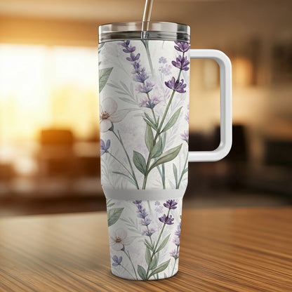 Lavender floral pattern on a white insulated tumbler with handle.