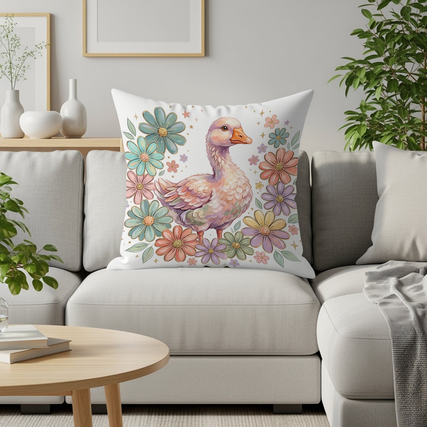 Pillow with a goose surrounded by colorful pastel flowers on a sofa.