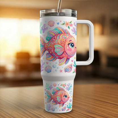 White tumbler with colorful fish and seashell graphics.