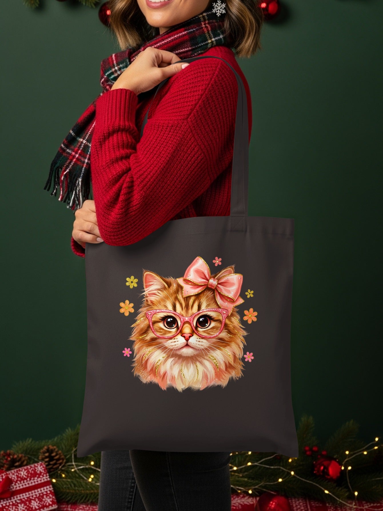 Tote bag with a sparkly cartoon cat wearing glasses and a bow.