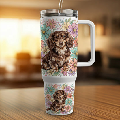 Dachshund dog on floral tumbler with handle and straw.