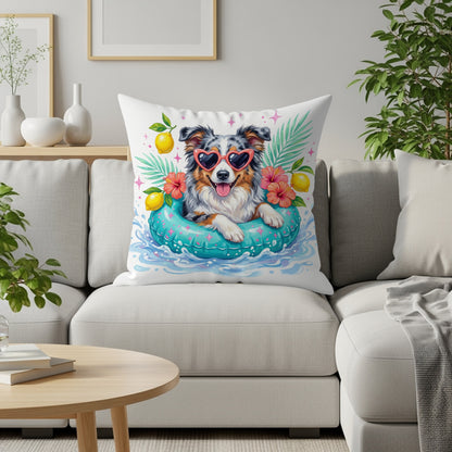 Australian Shepherd wearing heart sunglasses floats in pool with flowers and lemons.