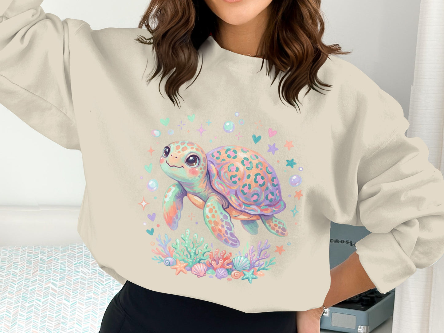 Cute watercolor sea turtle with bubbles and seashells on a cream sweatshirt.
