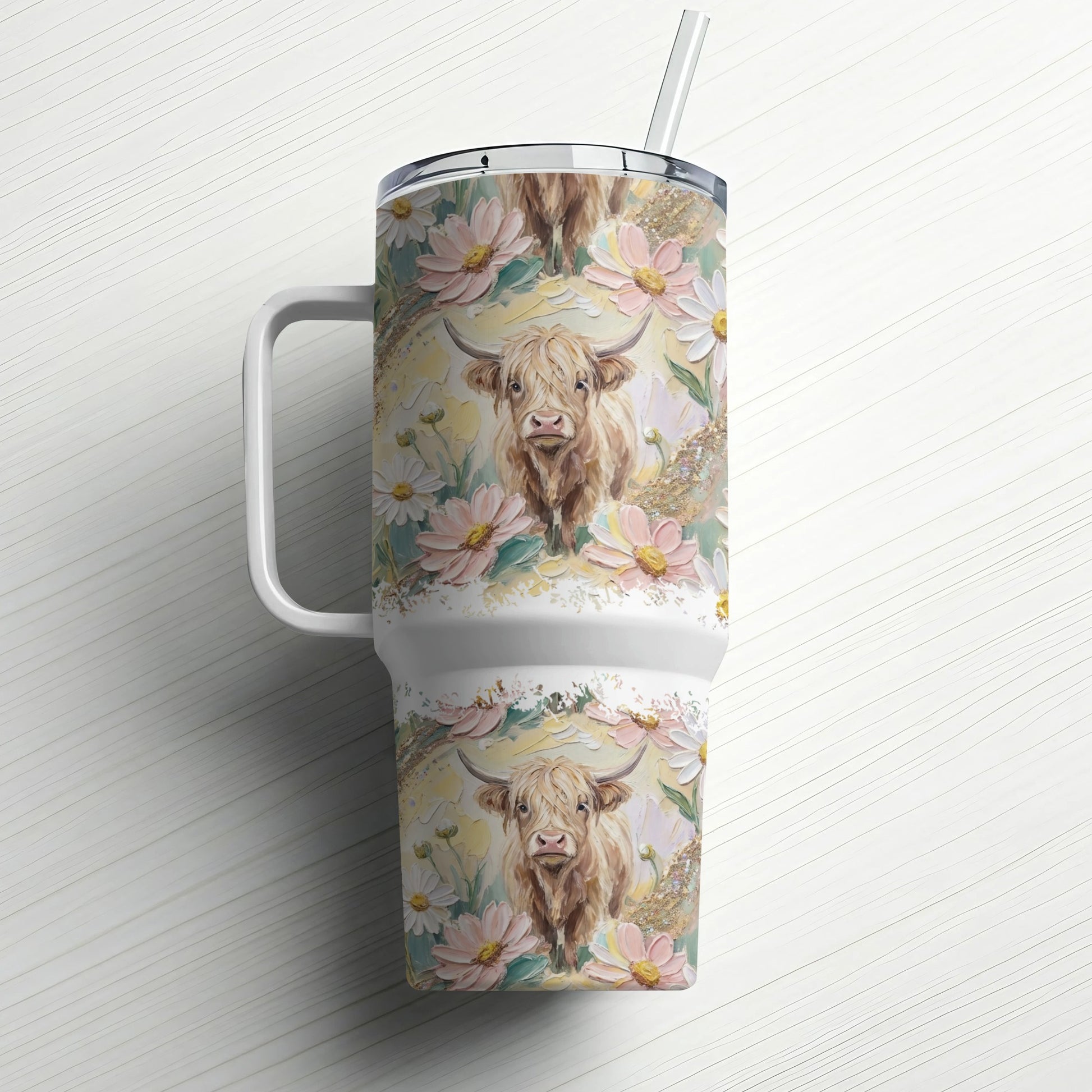 Tumbler with Highland cow and floral pattern.