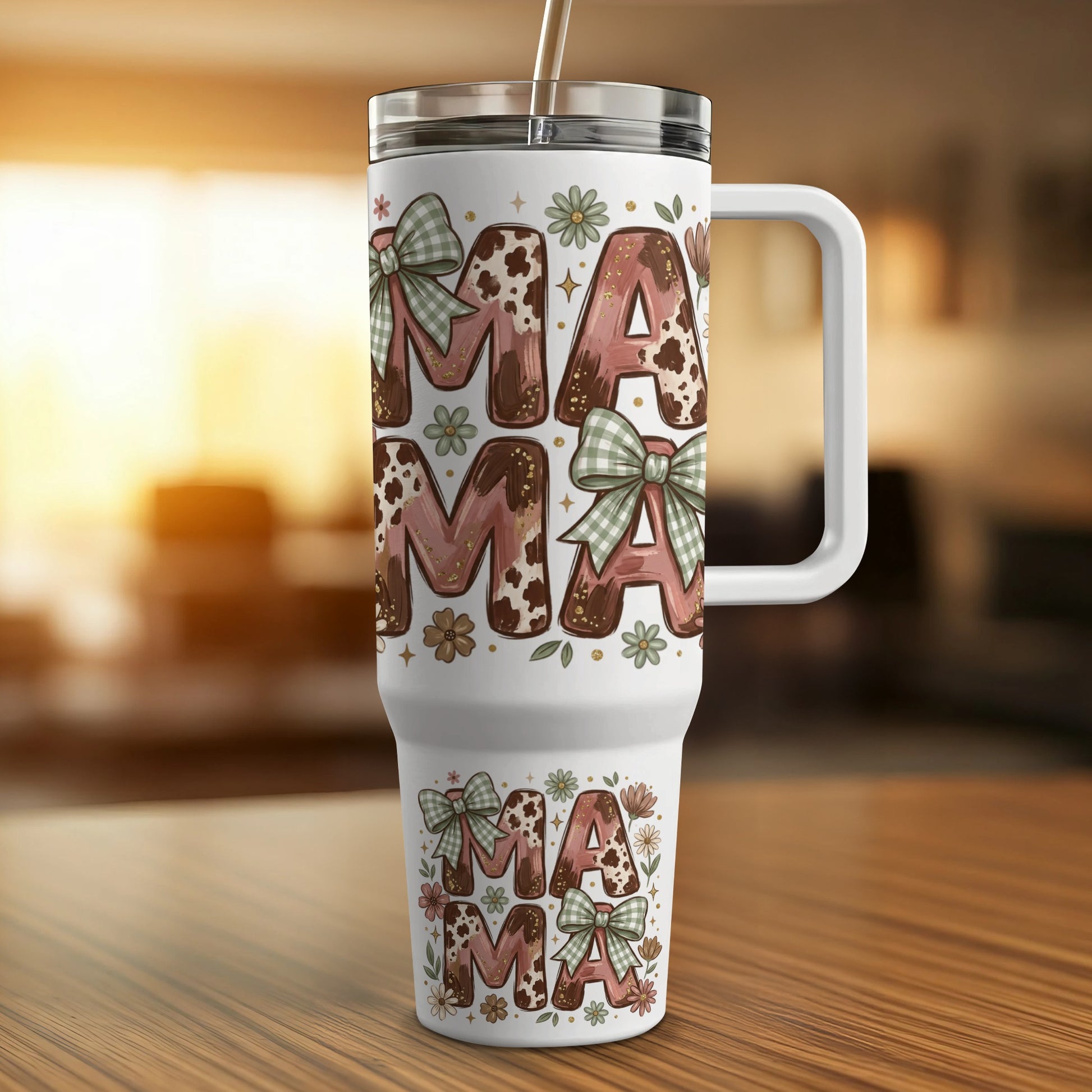 White tumbler with "MAMA" pattern and green plaid bows.