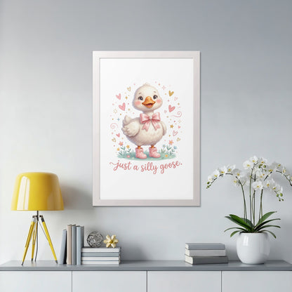 Framed artwork of a cute cartoon duck wearing pink boots and a pink bow.
