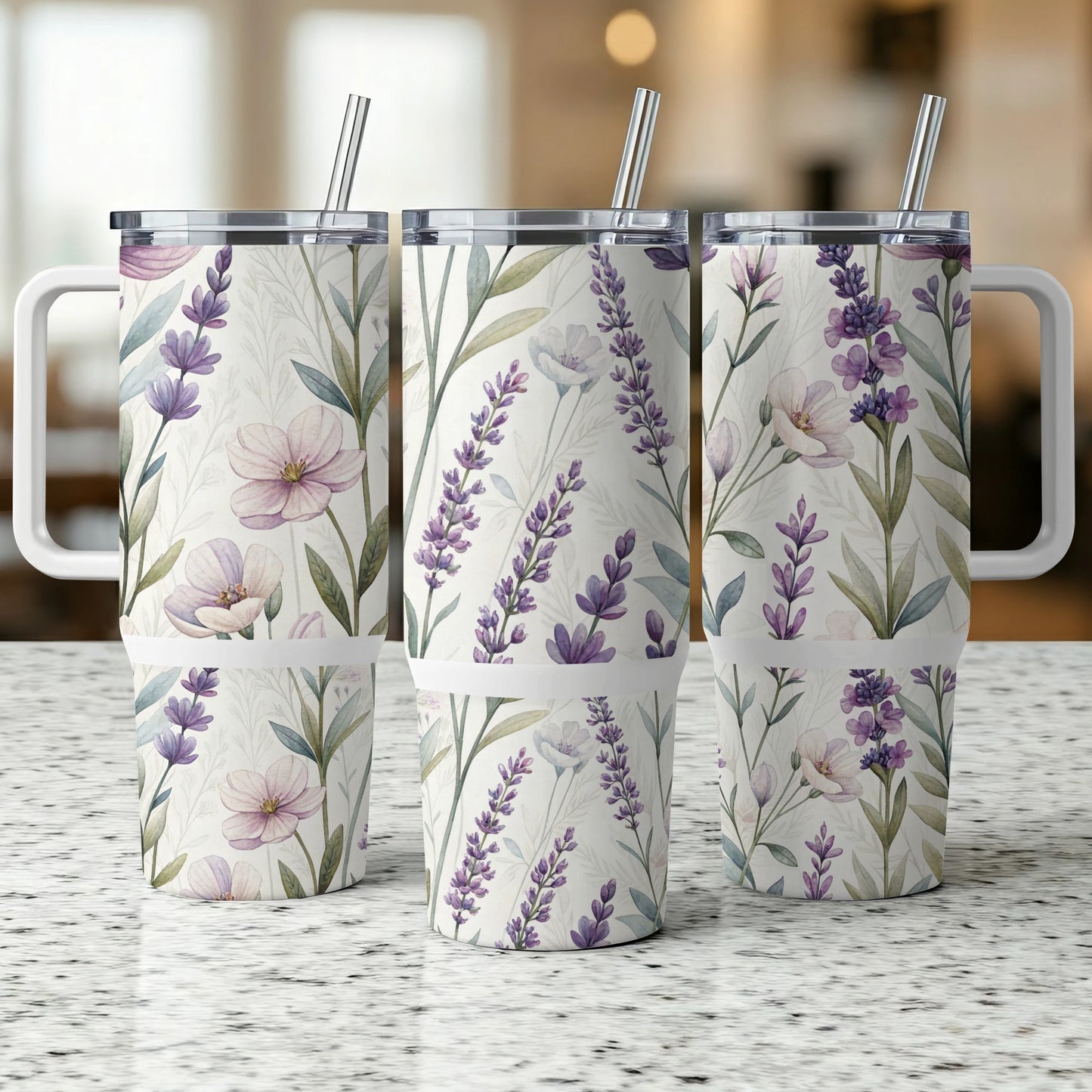 Three insulated tumblers with a lavender floral pattern.