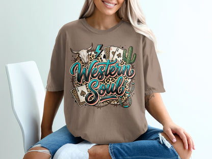 T-shirt graphic with "Western Soul" text, a bull skull, cactus, and playing cards.