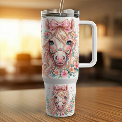 Pink floral unicorn horse head with bow on a white travel tumbler.