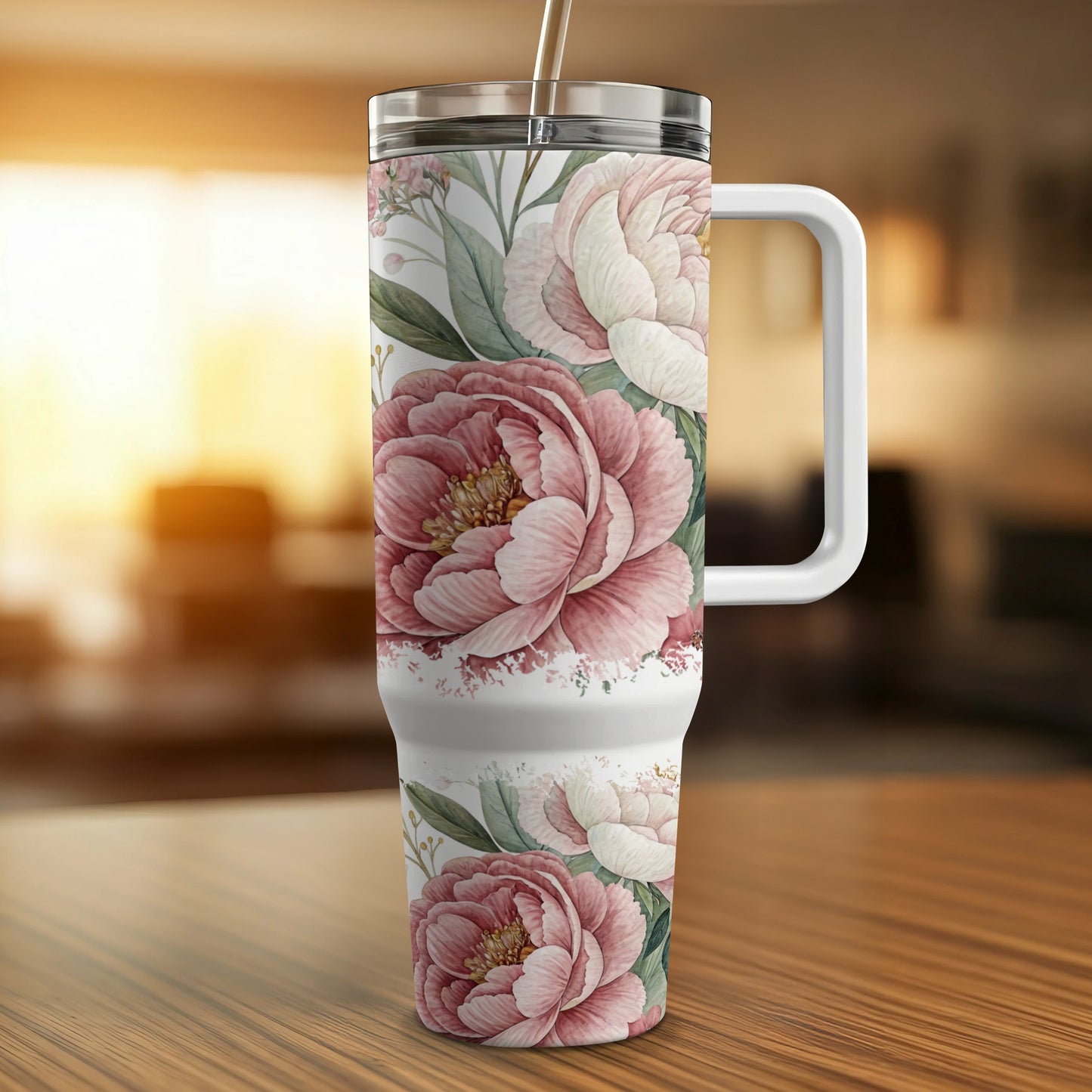 Floral tumbler with handle featuring pink peonies and greenery.