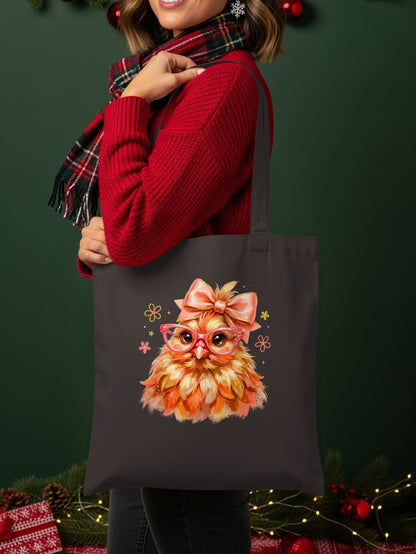 Tote bag with a cute fluffy chicken wearing pink glasses and a bow.