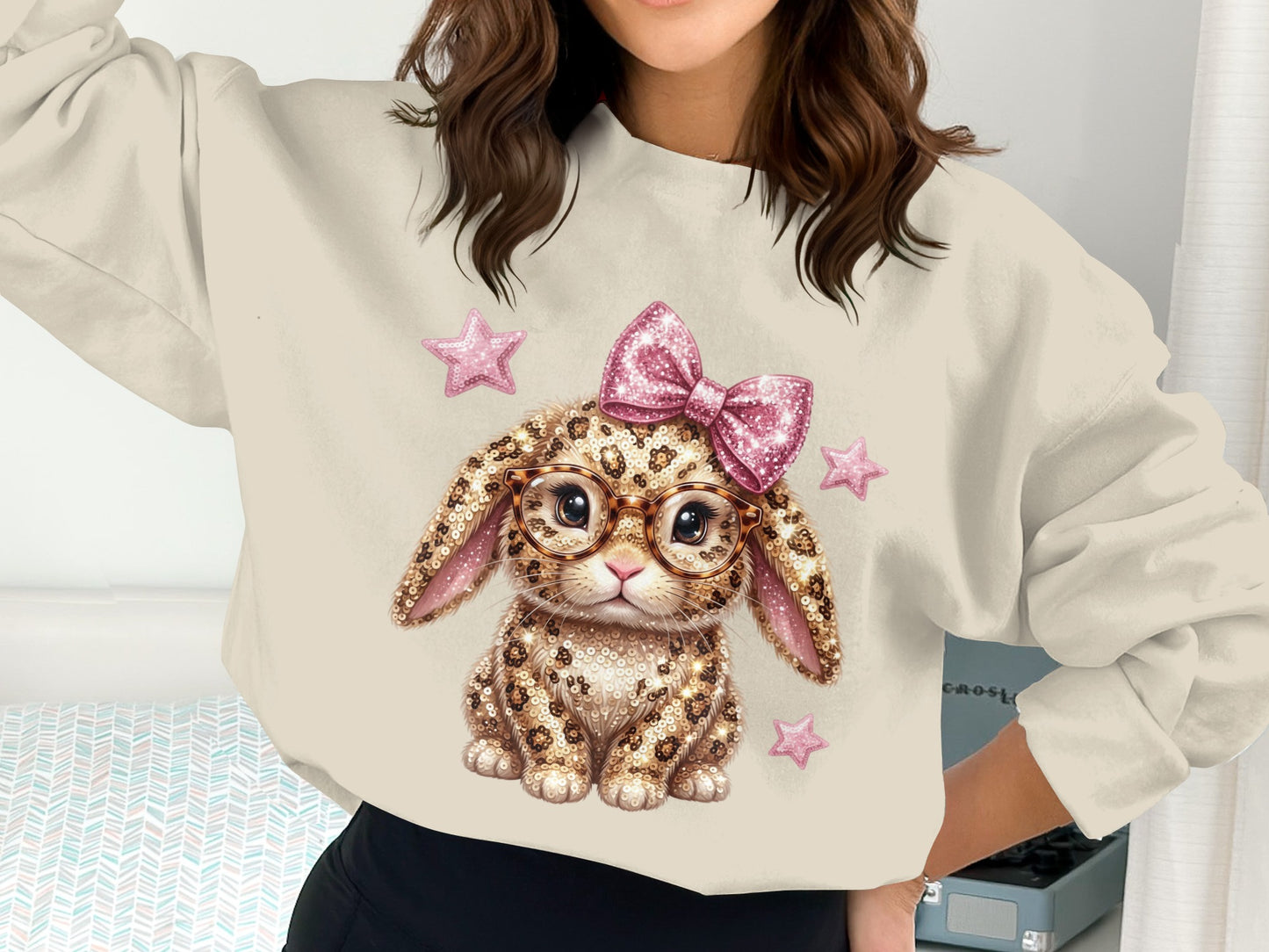 Leopard print bunny with pink bow and glasses on sweatshirt.
