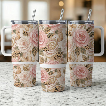 Three tumblers with a floral, butterfly, and leopard print design.