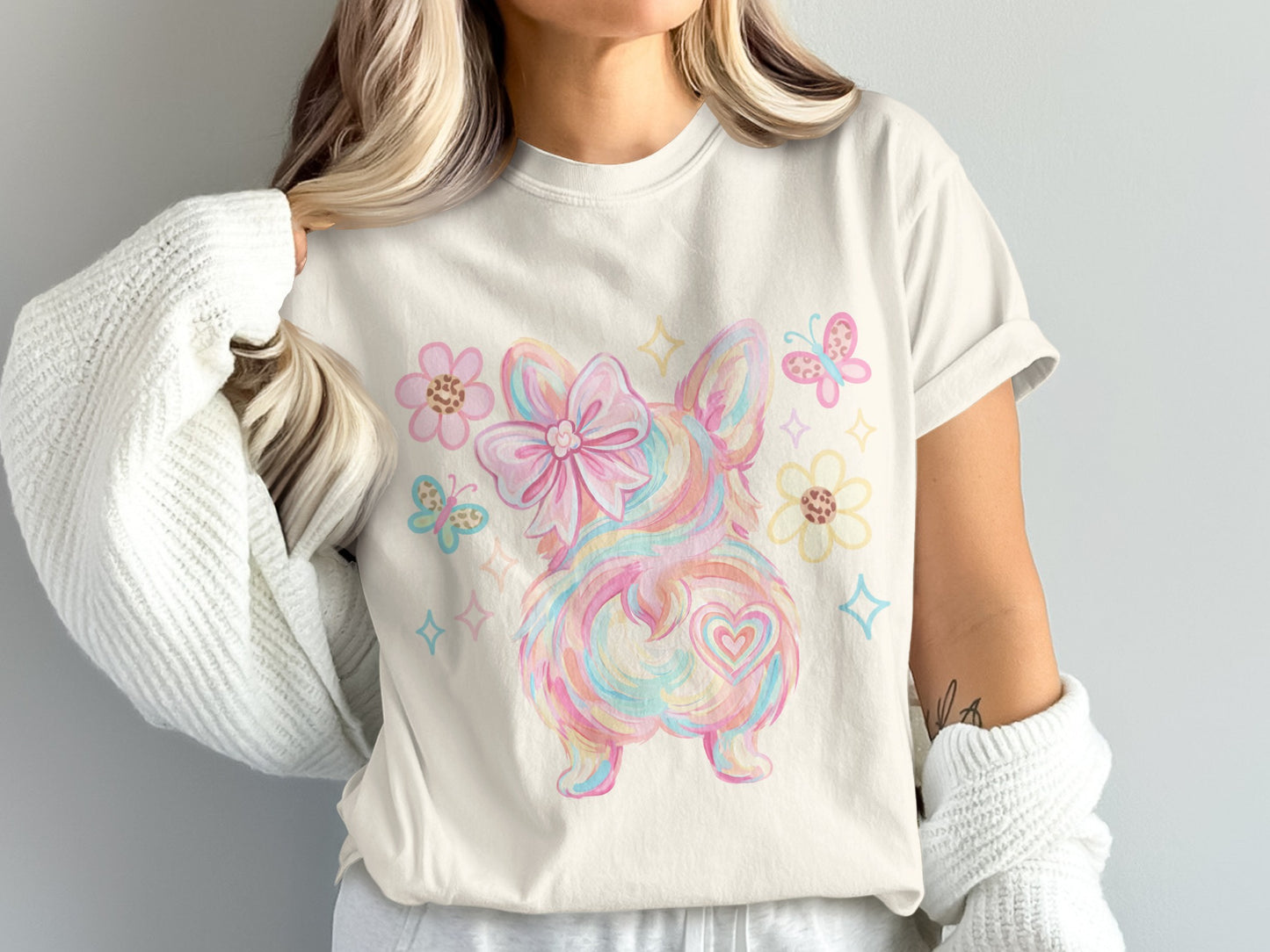 Pastel corgi butt with bow, hearts, flowers, and butterflies.