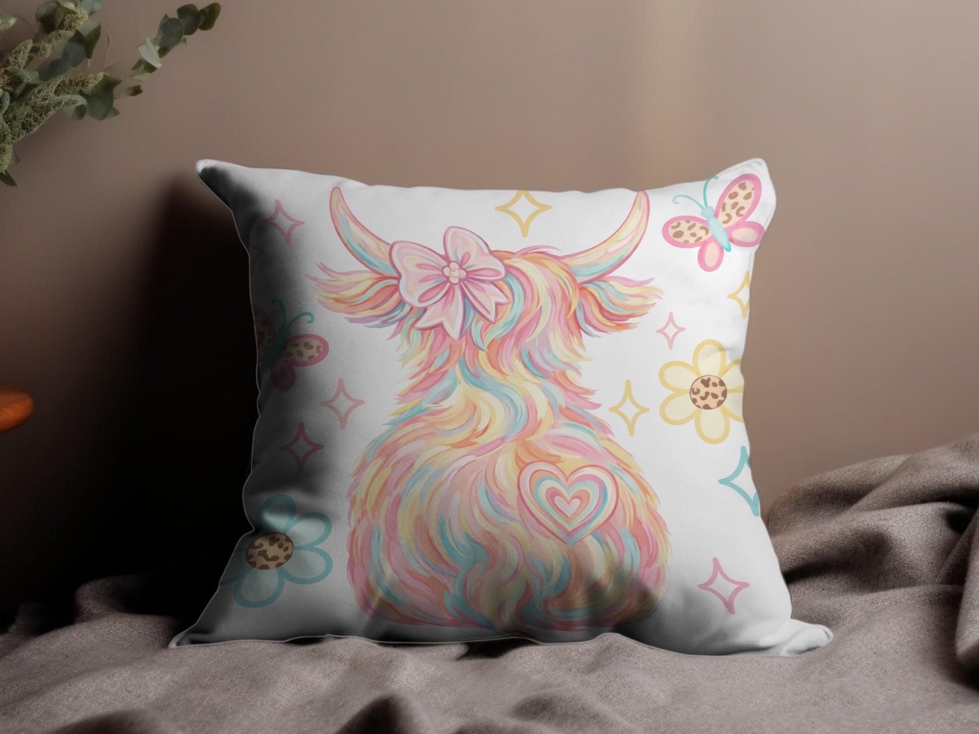 Fluffy Highland cow with pastel colors, bow, heart, and flowers.